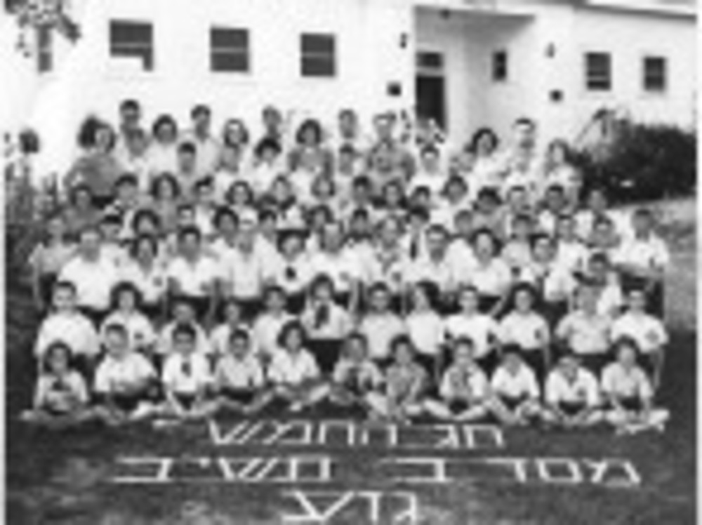 Geza age group campers – ages 7 – 10 – and their counselors gather at Camp Massad upon the camp’s fifth anniversary, probably in 1951. Varda Lev, then a counselor at the camp, is in the back row, center. Varda told The Jewish Voice & Herald that many of these campers became well-known and well-respected scholars of Judaic studies.  /Courtesy Varda Lev
